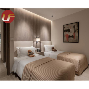فندق Mainstay Suites By Choice أثاث خشبي لغرفة النوم في فندق تم تعيينه بواسطة Top Hotel Project